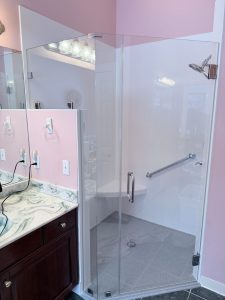 Unique shower and enclosure with knee wall